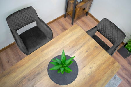 Tapicerowany fotel AMALFI - Szare, welurowe krzesło kubełkowe z podłokietnikami