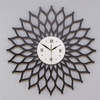 Nowoczesny zegar ścienny ażurowy SUNBURST inspirowany motywem słońca, czarny, ORNAMENTI