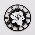 Zegar ścienny z tropikalnym motywem kwiatu STORCZYKA w kolorze czarno-białym, ORNAMENTI